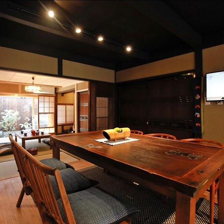 京町家の宿 三石 Kyoto Bagian luar foto